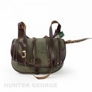 Hunting bag made of leather and tarpaulin